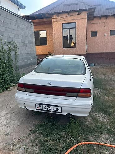 сефия: Nissan Altima: 1995 г., Седан — 2
