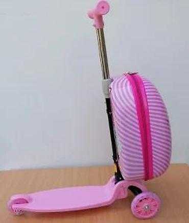 Trotineti, skejtbordovi i hoverbordovi: Dečiji trotinet sa integrisanim koferom u roze boji, idealan za — 21