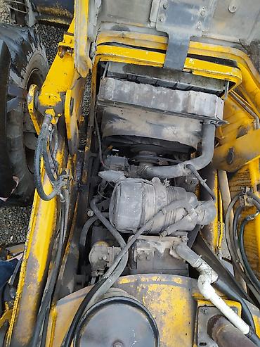 Ekskavatorlar: MST ekskavator-yükləyici (backhoe loader) - Marka/model: MST M5 — 11