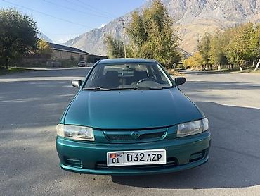плуг для мтз трактора: Mazda 323: 1997 г., Механика, Бензин, Седан — 1