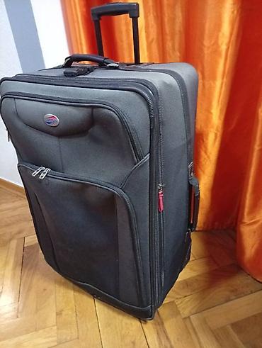 Putni koferi i torbe: Veliki kofer na točkiće – American Tourister. 75 45 30 - — 3