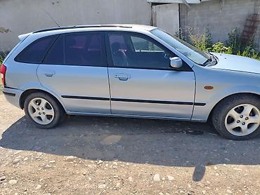 Транспорт: Mazda 323: 2000 г., 1.5 л, Механика, Бензин, Универсал — 1