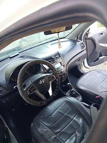 мини электро: Hyundai Solaris: 2012 г., Механика, Седан — 4