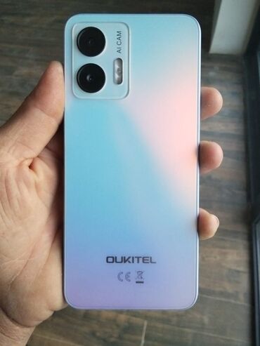 səs ucaldan qiyməti: Oukitel markalı bu mobil telefon arxa tərəfində iki kamera və bir flaş