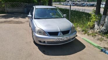 аралаш уналар: Mitsubishi Lancer Evolution: 2005 г., 1.6 л, Автомат, Бензин