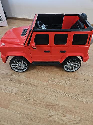 oyuncaq pultlu maşın: Uşaq üçün elektrikli minik maşını – kupe tipli, qırmızı rəngdə SUV — 1