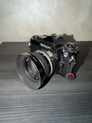 nikon 50mm: Analog lent ile Nikon FE fotoaparat. Uzerinde Ideal veziyyetde Nikkor — 3