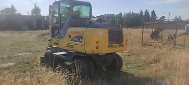 Экскаваторы: Экскаватор, 2013 г., Колесный — 2