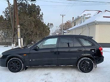 Mazda: Mazda 323: 2000 г., 1.8 л, Механика, Бензин, Универсал — 4