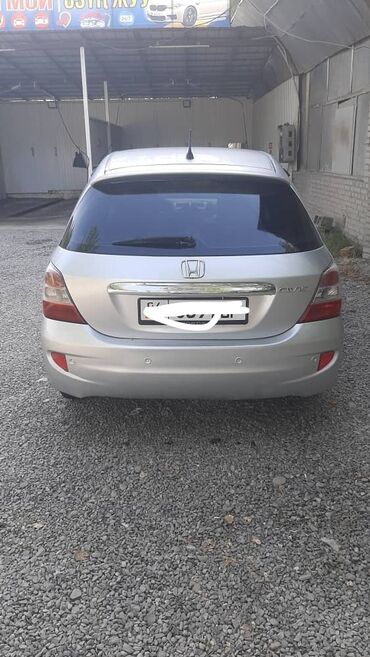 машина лонос: Honda Civic: 2005 г., 1.3 л, Механика, Бензин