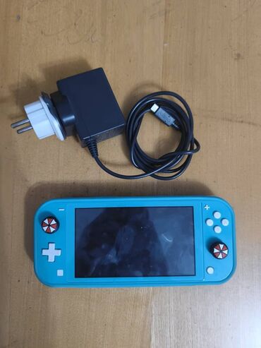 корпус ноутбука: Прошитый (чипованный) Nintendo Switch Lite бирюзового цвета. Память