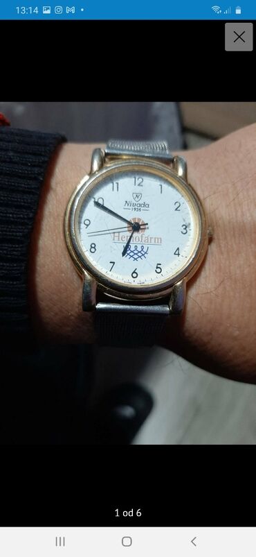 Watches: Sat Nevada ispravan ovo je stari model sata sat je made sviss,ima malo