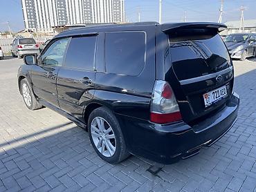 значок bmw: Subaru Forester: 2006 г., 2 л, Автомат, Бензин, Кроссовер — 4