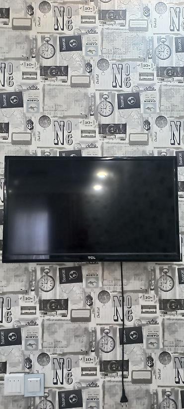 tcl телевизор: TCL LED televizor - Ekran ölçüsü: təxminən 32–40 düym aralığı (divara — 1