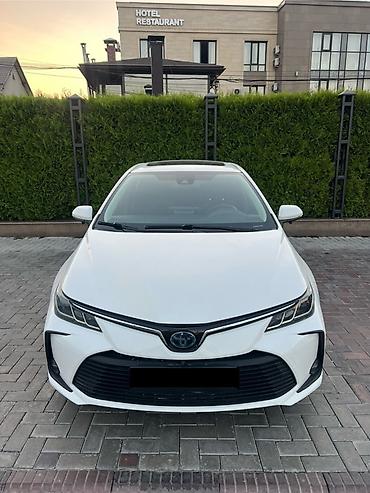 Toyota Corolla: 2020 г., Гибрид, Седан