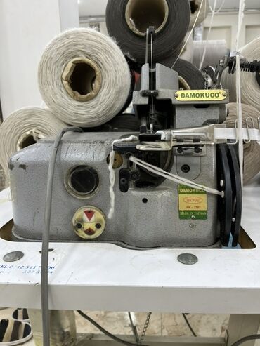 Digər istehsal avadanlığı: Xalça kənarı vurma (overlok) avadanlığı və iri həcimli sap bobinləri — 6