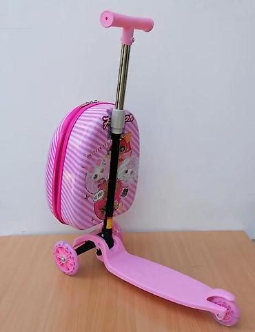 Trotineti, skejtbordovi i hoverbordovi: Dečiji trotinet sa integrisanim koferom u roze boji, idealan za — 10