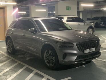аренда авто под выкуп без залога: Элегантный внедорожник Genesis GV70 серого цвета, идеально подходящий