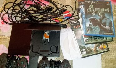 2 ci əl soyuducular: PS2 satlir yeni kimidi az isdifade olunub usdunde 15oyun disiqi