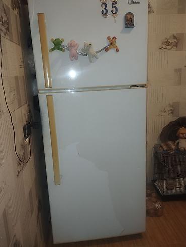 Midea iki qapılı soyuducu - Üst qapı – dondurucu bölmə, alt qapı –