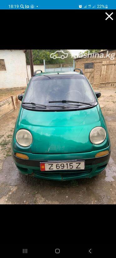 мини электромобиль: Зеленый хэтчбек Daewoo Matiz, компактный автомобиль, предназначенный