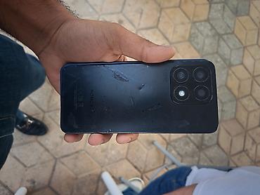 14 pro irsad: Honor 128 GB, rəng - Qara, Barmaq izi, İki sim kartlı, Face ID — 3
