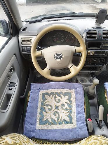 led свет: Mazda Demio: 2001 г., 1.3 л, Механика, Бензин, Хэтчбэк — 10
