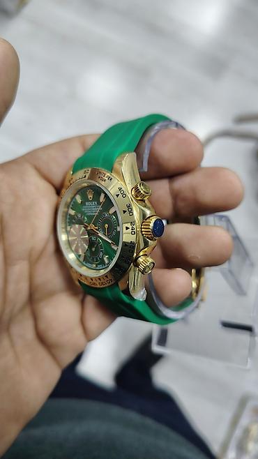 meta eynək: Rolex Oyster Perpetual Cosmograph tərzində kişi qol saatı Rolex, Rolex — 2