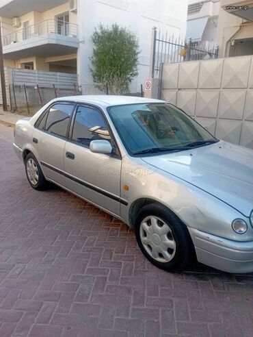 Toyota Corolla: 1.6 l | 1997 year Limousine