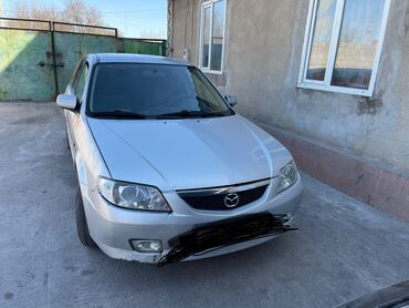 афто токмок: Mazda 323: 2001 г., 1.6 л, Механика, Бензин, Хетчбек