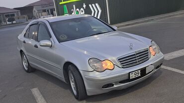 Mercedes-Benz: Mercedes-Benz 220: 2.2 l | 2001 il Sedan