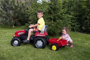 Nemacki traktor na pedale Rolly Junior sa kid prikolicom Cena 14490