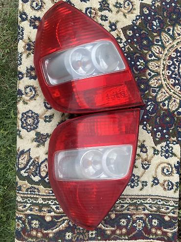 оптом светы: Комплект стоп сигналов Honda фит б/у — 1
