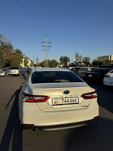 byd e1: Toyota Camry: 2019 г., 2.5 л, Вариатор, Гибрид, Седан — 4