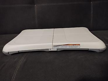 Видеоигры и приставки: Wii fit Nintendo original. Əla veziyyetdedir, coystik tutucusu ve — 3