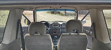 трёхдверный: Mitsubishi Pajero Junior: 1996 г., 1.1 л, Автомат, Бензин, Внедорожник — 9