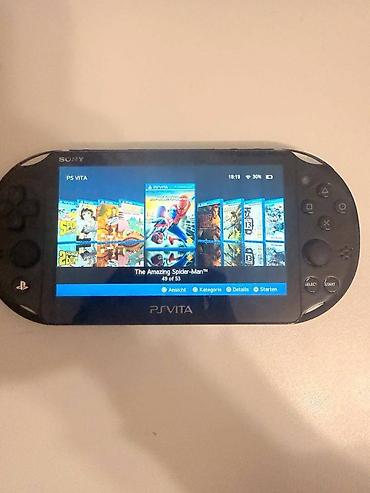 PS Vita (Sony Playstation Vita): Playstation vita ideal veziyyetdedir. Hec bir problemi yoxdu. Ciziqi — 3