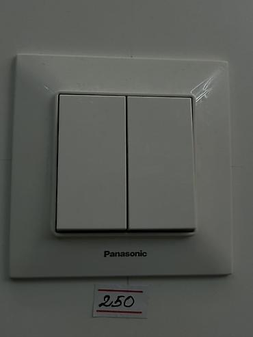 Двойной настенный выключатель Panasonic. - Тип: механический