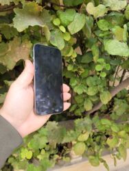 Apple iPhone: IPhone 15 Pro, 128 GB, Natural Titanium, Face ID — 9