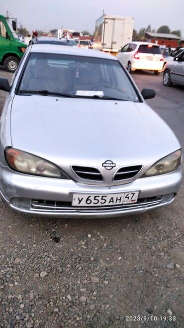 мерседес 1994: Nissan Almera (седан), серебристый цвет, российские номера 47 региона