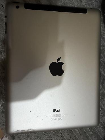 mini ipad: Apple iPad planşet - Gümüş rəngli alüminium korpus, ön hissədə şüşə — 1