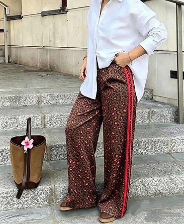 tigraste baletanke: 🔥Ženske široke pantalone sa animal printom i bočnim prugama
✅2400 din — 6
