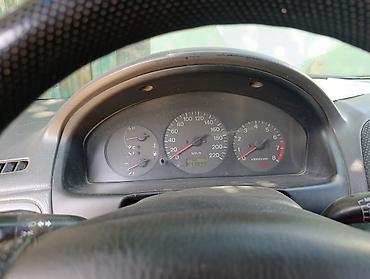 мазда 323 фк: Mazda 323: 1998 г., Хэтчбэк — 8