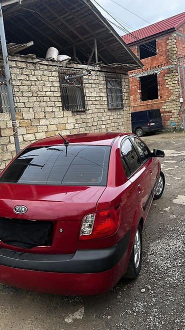 90 fa 373: Kia Rio: 1.4 l | 2010 il Sedan — 8