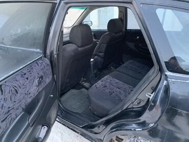 Mazda: Mazda 323: 2002 г., 1.8 л, Механика, Бензин, Хэтчбэк — 6