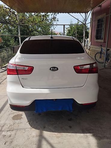 lizing avtomobiller: Kia Rio: 1.6 л | 2015 г. Седан — 4