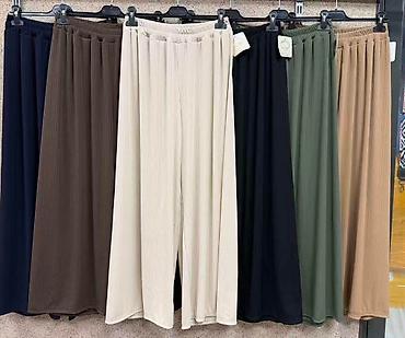 Ženske široke plisirane pantalone sa lastišem u struku - Kroj: široke — 1