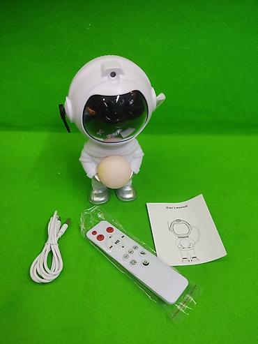планетарий мобильный: Проектор “Astronaut Nebula Projector” - Настольный проектор в форме — 1