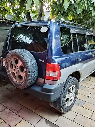 mitsubishi carisma 1 6: Mitsubishi Pajero iO: 1998 г., 1.9 л, Автомат, Дизель, Внедорожник — 4
