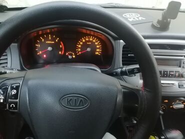Kia: Kia Pride: 1.5 l | 2006 il Sedan — 3